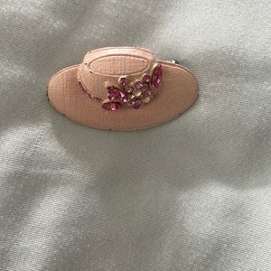 Pink hat brooch
